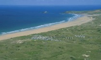 Birdeye view of Beachside Holiday Park and St Ives Bay in Cornwall