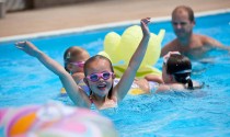 Family swiming in the pool facilities at Beachside Holiday Park in Cornwall