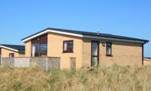 Beachside bungalow with blue sky