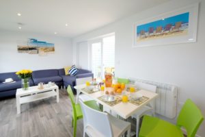 View of living room in holiday apartment at Beachside Holiday Park, Hayle, Cornwall