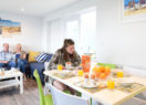 Interior view of new apartment accommodation living room at Beachside Holiday Park, Cornwall