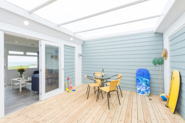 Interior view of apartment accommodation patio at Beachside Holiday Park, Cornwall