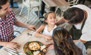 Family eating in a holiday park restaurant